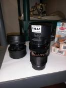 2 cased camera zoom lenses (one being a Hoya skylight)