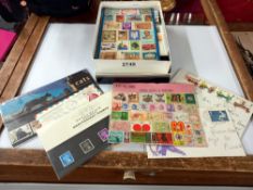 A box of stamps including presentation sets etc.