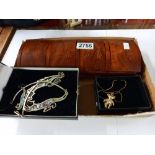 A wooden box and good lot of costume jewellery