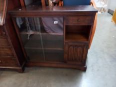 An oak glazed bookcase with side cupboard and drawer, COLLECT ONLY.