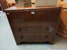 A mid 20th century oak ply three drawer chest, COLLECT ONLY.
