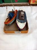 2 vintage battery operated boats, RNLI lifeboat and a fishing trawler