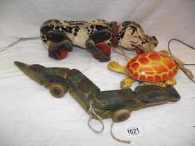 Early Wooden Fisher Price Snoopy dog, Mobo pressed steel tortoise and a wooden pull along