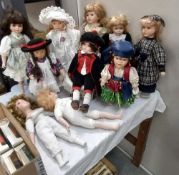 A quantity of collectors dolls
