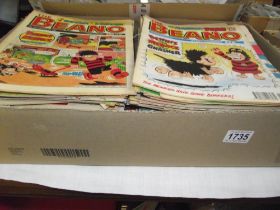A large box of 1980's/90's Beano comics