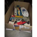 A boxed Schuco servo 5312 battery operated Ferrari and Sutcliffe Merlin electric speedboat