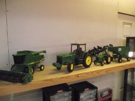 An ERTL John Deere 8200 tractor 9500 combine harvester etc