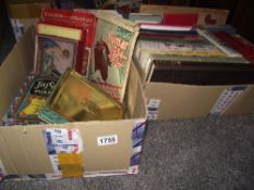 A quantity of vintage puzzles and childrens books