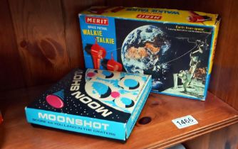 A boxed Merit Space patrol walkie talkie and moon shot tiddly winks game