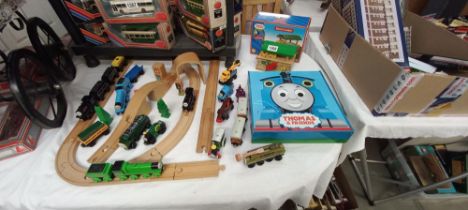 A quantity of Thomas the tank engine models plus wooden Brio railway set etc