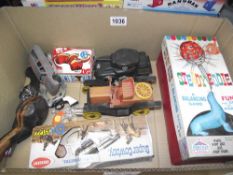 A box of mixed toys including Tri-ang Minic tank, clockwork tinplate cat, Crescent super cowboy