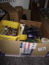 A box of misc including artillery cannons playing cards and dice, Britains soldiers and miniature