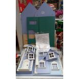 An unmade, unboxed dolls house, believed to be complete COLLECT ONLY