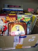 A large box of vintage children's annuals etc including Doctor Who, Tiswas, Beano etc