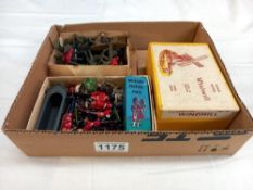 A box of lead and plastic soldiers including Britain's and boxed FG Taylor farm series windmill
