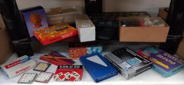 A good selection of vintage games etc including chess set, dominoes etc on 2 shelves