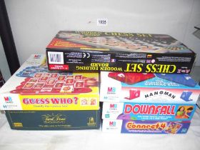 A quantity of games including a chess set, Trivial Pursuit, Hangman etc
