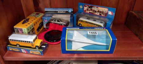 A quantity of diecast and a Concorde model and paperweight