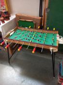 A table soccer football game with original box and 1 other item COLLECT ONLY