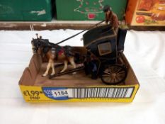 A vintage scratch built model of a Victorian handsom cab with pottery horse