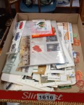 A tray of stamps including first day covers, presentation packs & loose stamps including Penny