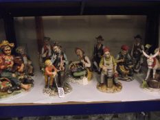 7 Capodimonte style tramp figures COLLECT ONLY