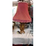 A cherub table lamp with shade COLLECT ONLY
