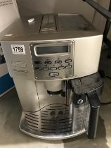 A Delonghi Magnifica Auto Cappuccino Machine COLLECT ONLY