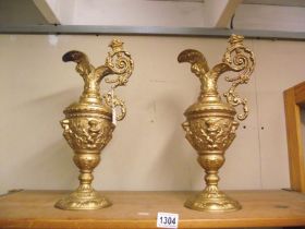 A pair of 19th / 20th Century spelter ewers (1 a/f to spout) COLLECT ONLY