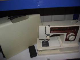 A cased Singer sewing machine COLLECT ONLY