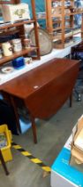 A dark teak drop leaf dining table COLLECT ONLY