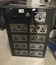 A multi socket power supply box (16 sockets but power head has been cut off) COLLECT ONLY