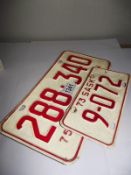 A motorcycle number plate & car number plate 1973 & 1975 from Saskatchewan