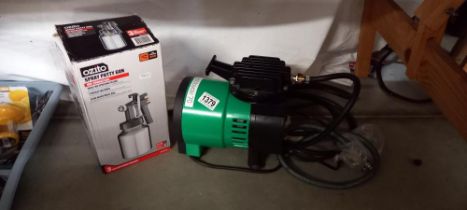 A Hobby Airyo air pump 400 piece anvil rotary tool accessories and an Ozito spray putty gun 160/