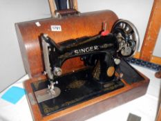 A Cased Singer Sewing machine in working order, COLLECT ONLY.
