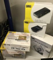 A Boxed Belkin 6 Port Hub 2 x Psion Gold Port Adapter and 3 Gold PC Global Cards COLLECT ONLY