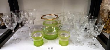 A quantity of drinking glasses & a lovely vintage water/juice jug with green stripes COLLECT ONLY