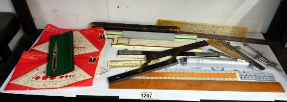 A quantity of measuring devices, rulers, compasses etc