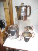 A 4 piece silver plate tea set (teapot, hot water jug, milk jug and sugar bowl)