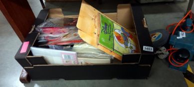 A large box of cross stitch and craft sewing items
