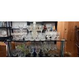 2 shelves of crystal and other drinking glasses including a decanter COLLECT ONLY