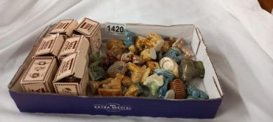 A boxed Wade bear ambitions and quantity of loose Wade Whimsies