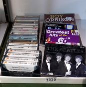 A quantity of cassettes & CD's including The Shadows, Buddy Holly & Cliff Richard etc. COLLECT ONLY