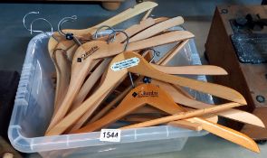 A box of wooden coat hangers COLLECT ONLY.