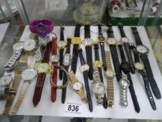 Approximately twenty five assorted wrist watches.