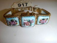 A Russian porcelain encased ladies wrist watch.