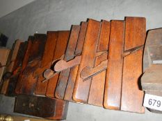 A quantity of old carpenter's moulding planes.