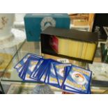 A quantity of Pokemon cards in steam seige box.