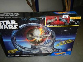 A boxed Star Wars Hot Wheels 'Death Star Revolution Race'