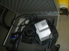 A cased JVC digital video camera.